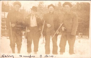 Real Photo Postcard Four Men Hunting with Rifles in the Snow