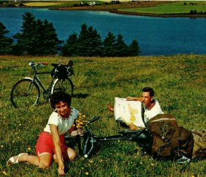 Greetings from Prince Edward Island, bicycling couple, map, Canada Postcard