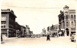 Wellington Kansas Washington Avenue Street Scene Real Photo Postcard AA74646