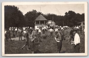 RPPC US Army Soldiers Setting up Tent Camp Postcard J21