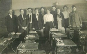 C-1910 Teacher Group Classroom interior RPPC Photo Postcard 21-11569