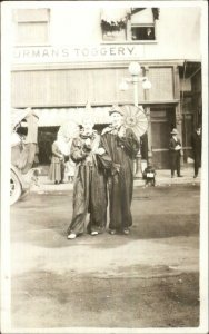 Clowns Pierrots in Street Circus? Thurman's Toggery Store Real Photo Postcard