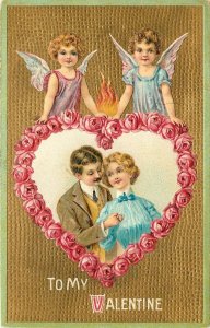 Embossed Valentine Postcard 668 Cupids, Loving Couple in Rose Vignette