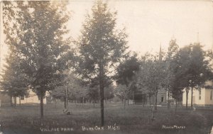 H36/ Burr Oak Michigan RPPC Postcard c1910 Village Park Church  93
