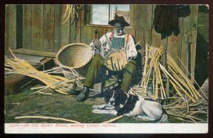 h2375 - BLACK AMERICANA Postcard 1900s Old Basket Maker. Dog