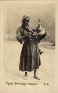 Egypt Native Man Beverage Vendor Canadian Pacific Cruise RPPC #7 dcn