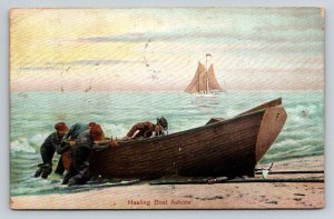 1908  Hauling Boat Ashore  Sailboat  Row Boat    Postcard