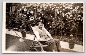 RPPC Lawn Boy Man With His Retro Mower And Beautiful Flower Garden Postcard S30