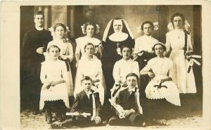 Class School Gradates C-1910 Nun Priest RPPC Photo Postcard Interior 5506