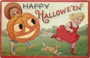 Embossed Halloween Postcard  Boy Chases Girl with Jack o Lantern, IAPC