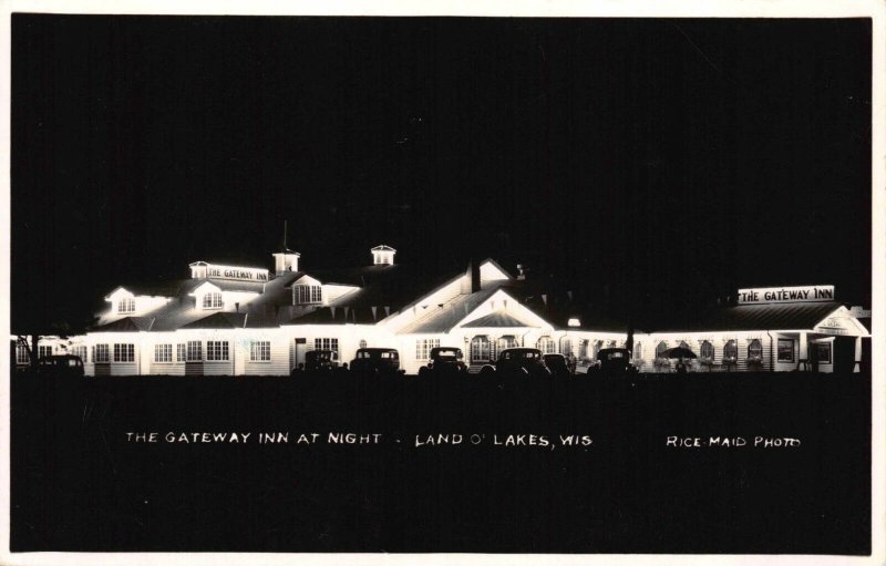 Real Photo Postcard The Gateway Inn at Night in Land O'Lakes, Wisconsin~118056