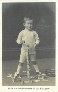 Postcard RPPC C-1910 Boy playing cards toy blocks interior TP24-2832