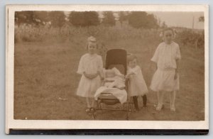 RPPC Darling Edwardian Children With Baby Stroller In Field Photo Postcard V22