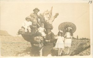 Postcard RPPC Photo Oregon Coast People Driftwood Stump 23-6