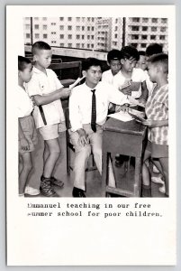 Hong Kong RPPC Emmanuel Teaching The Poor Children In Free School Postcard N28