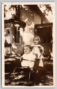 Real Photo Postcard~3 Yr Old Sis Pushes Baby Brother in Stroller~Buggy~1910 RPPC