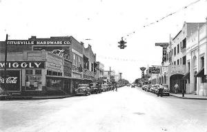 Titusville FL Street View Storefronts Coca Cola Signs RPPC Postcard