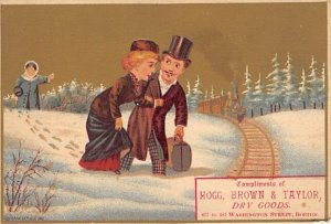 Approx. Size: 3 x 4.25 Man and woman walking through the snow to the train  L...