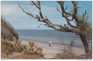 Strolling on beach , JEKYLL ISLAND , Georgia , 1950s-60s