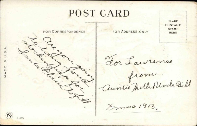 Little Boy and Girl Open Stockings Christmas Morning Vintage Postcard