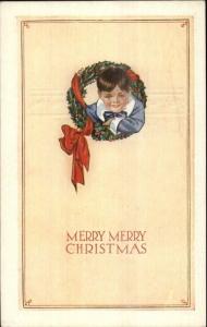 Christmas - Little Boy Through Wreath c1910 Postcard