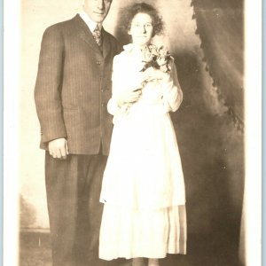 1910s Couple Husband & Wife RPPC Real Photo Antique Postcard Man Lady Flowers A1
