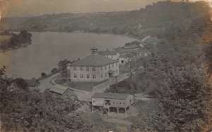 RPPC Thompsons Livery, School House, River in Thompson, Pennsylvania~115596