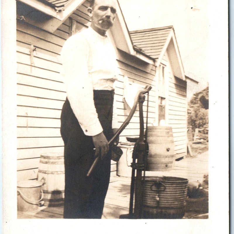 c1910s Pumper Man Pumping Outdoor Pump RPPC Water Bucket Barrel Real Photo A140