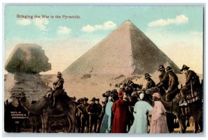 c1910 Bringing The War to the Pyramids Sphinx Camels Men Giza Egypt Postcard