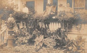 RPPC FAMILY PORCH FAUNA PLANTS GAINSVILLE FLORIDA REAL PHOTO POSTCARD (c. 1920)