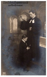 Priest blessing boy for Confirmation