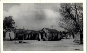 HENRYETTA, OK Oklahoma  ELLIS DOWN TOWN COURTS   c1940s    Roadside   Postcard