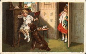 In Disgrace Dog Comforts Little Crying Boy Girl and Doll c1910 Postcard