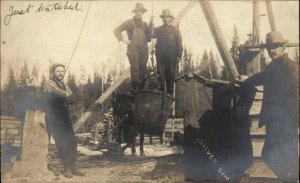 Steam Machinery Logging Camp? Men Stand in Hoisted Bucket Canada? RPPC