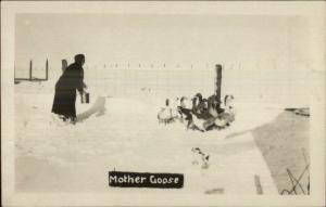 Woman Feeding Geese in Winter MOTHER GOOSE c1910 Real Photo Postcard