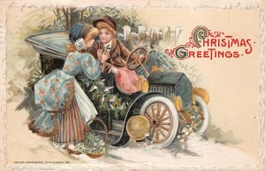 CHRISTMAS HOLIDAY CHILDREN CAR WINSCH SCHMUCKER EMBOSSED POSTCARD 1911