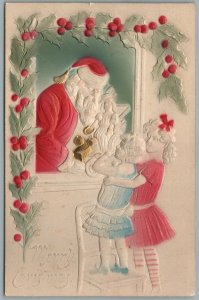 SANTA w/ LITTLE GIRLS MERRY CHRISTMAS EMBOSSED ANTIQUE POSTCARD