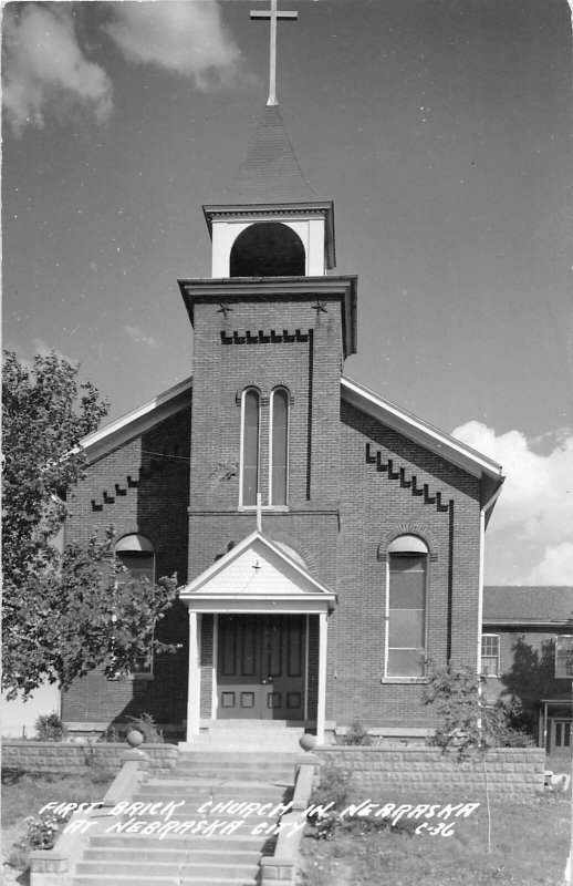 G32/ Nebraska City Nebraska RPPC Postcard c1940s First Brick Church Nebraska