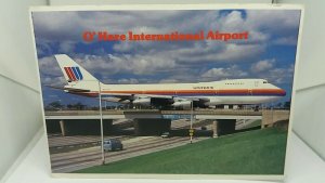 Postcard United Jumbo Jet Taxis across Expressway O Hare International Airport