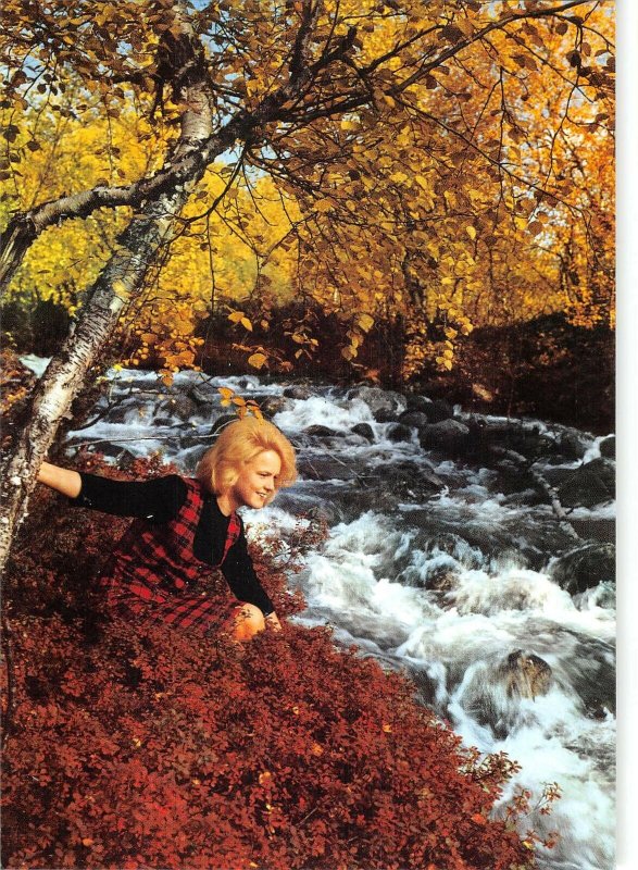 B109487 Finland By foaming Rapids Woman, River Autumn Trees