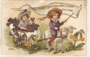 Boy leading lambs , with girl in flowered egg cart Lovely vintage Christmas PC