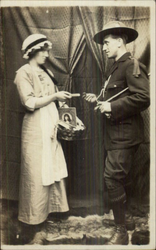 Scouts Young Man & Woman Selling Items c1910 Real Photo Postcard