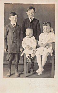 4 CHILDREN-STYLISH PERIOD CLOTHING~1910s REAL PHOTO POSTCARD