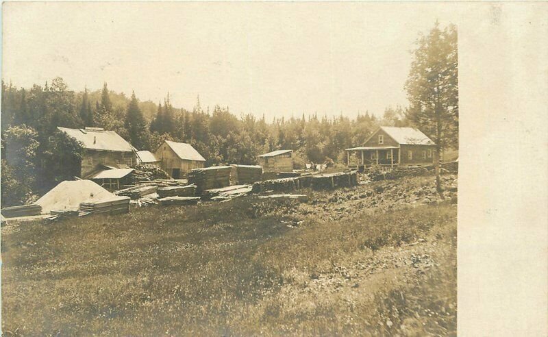 Advertising C-1910 Lumber Yard Planks Deering Machinery Photo Postcard 20-390