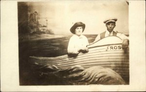 Studio - Man & Woman in Row Boat ROSE c1910 AZO Real Photo Postcard