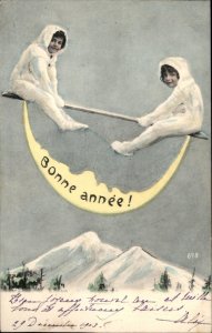 New Years Bonne Annee Children Crescent Man in Moon SeeSaw Vintage Postcard