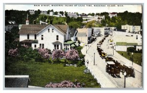 MI Main Street Mackinac Island Michigan Lilacs Vintage Standard View Postcard