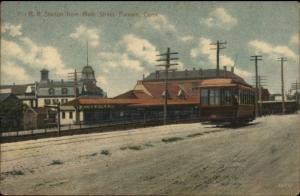 Putnam CT Trolley Going by RR Train Station c1910 Postcard jrf