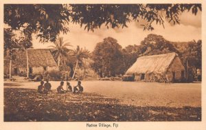 NATIVE VILLAGE FIJI POSTCARD (c. 1920s)