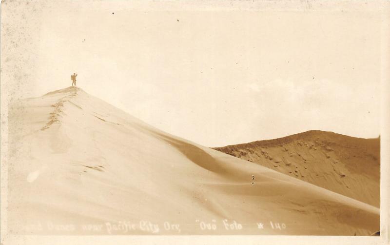 F25/ Pacific City Oregon RPPC Postcard c1920s Sand Dunes Hiker